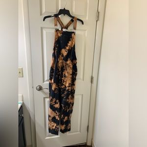 Woman’s overalls with side pockets, big front pocket and adjustable string